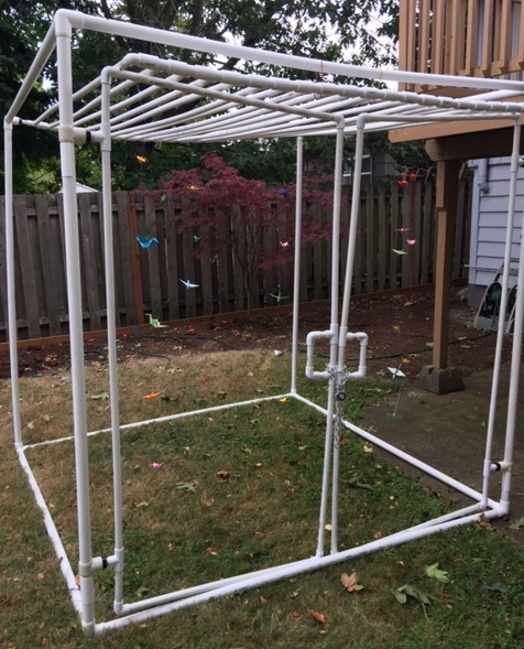 Picture of the cage being used for the Uncaging One Thousand Cranes project